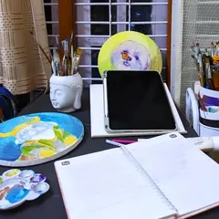 A snapshot of my workspace, with my iPad, sketchbook, and painting supplies all ready to go for the next project.