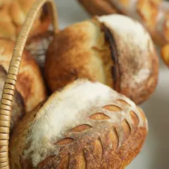 Look at the beautiful scoring on this artisan loaf, a technique we teach to control how the bread expands in the oven. Mastering this is key to creating professional looking sourdough style breads.