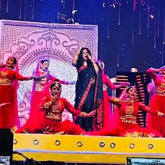 On stage is my happy space. Here I am, performing for the Stagecraft Awards, surrounded by the vibrant energy of dancers and a grand production.