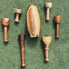 This is what our modular system looks like. One base weight, and a whole family of grips. Each handle changes the lever length and weight dynamics, giving you a completely different challenge and targeting different muscles.