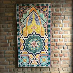 This vibrant mosaic tile art, with its intricate geometric patterns and rich colors, is a beautiful way to introduce spiritual and cultural elements into a space, creating a focal point that is full of meaning.