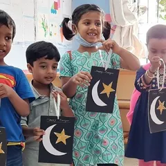 Children proudly display the lanterns they made to celebrate Ramadan. We learn about the importance of sharing and giving, and we create art that reflects the symbols of the festival.