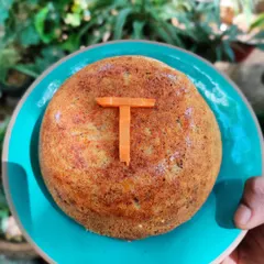 I bake custom birthday cakes for dogs, like this simple and healthy carrot and chicken cake. I can personalize it with your dog's initial, making their special day even more memorable.