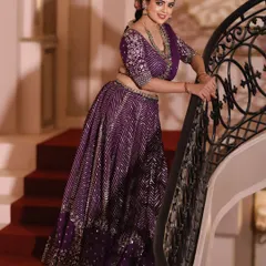 A full series showcasing a stunning purple lehenga with intricate silver work, styled for a Navratri theme.