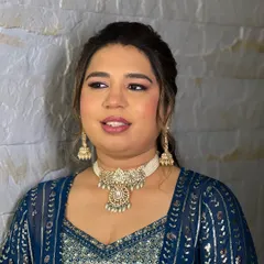 Another view of the elegant pearl choker, showing how it sits beautifully on the neckline. It's paired with matching jhumkas for a complete set.