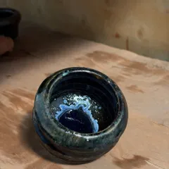 This handmade tea bowl shows the beautiful layers a glaze can build after being fired first in a gas kiln and then again in a wood firing. I call these my 'multi-purpose lovelies', perfect for your daily chai or snacks.