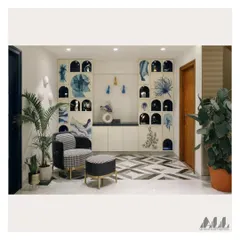 The completed study area, where the hand-painted bookshelf serves as the main feature. The design is complemented by a houndstooth accent chair, geometric flooring, and indoor plants.