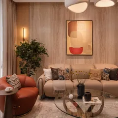 Soft tones and sculptural forms create effortless warmth in this living room. I brought together fluted wood panels, cozy textures, and organic curves to design a space that feels calm, modern, and deeply lived-in.