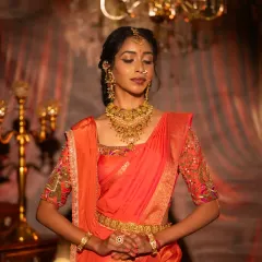 A serene and classic bridal portrait. This photo, taken during a student's portfolio shoot, highlights the soft glam makeup and traditional gold jewelry.