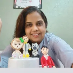 Take your cake decorating skills to the next level by learning to make your own fondant figures. Here I am with some cute, handcrafted toppers from my fondant art workshop.