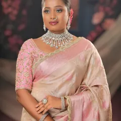 This look is all about celebrating her natural beauty. The makeup is soft and elegant, with a focus on highlighting her best features.