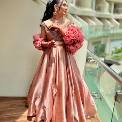 A side view of a bride with a high ponytail, showing how it creates a sleek and elongated silhouette. It's a sophisticated choice for a modern bride.