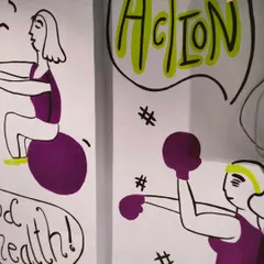 A close-up of the gym mural, showing doodles of a woman on an exercise ball and another boxing, with the word "Action" in a speech bubble.