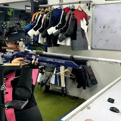 A shooter demonstrates perfect form during a 10m Air Rifle training session. My coaching focuses on building a stable stance, correct posture, and a consistent aiming process, which are the foundations of high-level marksmanship.