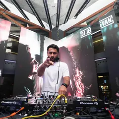 Another view of my setup at Flo, where the background visuals are synchronized with my DJ set. This is perfect for brand events that require custom logo displays.