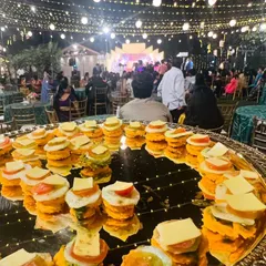 My signature Muruku Sandwich is a crowd favourite. This platter, ready for a wedding reception, shows how I blend traditional flavours with a modern, bite-sized presentation that guests love.