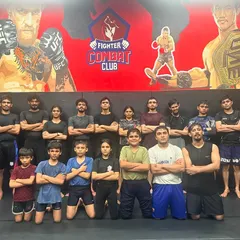 The fight team, arms crossed, showing their focus and unity. We stand together, ready for whatever comes next.