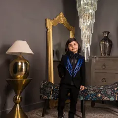 Here is a look at my custom wire detailed tuxedo. The jacket features striking blue satin piping on a black base, creating a modern and sharp silhouette for any formal occasion like a wedding or a milestone birthday party.