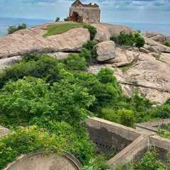 The ruins of a fort atop a rocky hill, a common sight on our treks around Karnataka. We combine adventure with a journey into the rich history of the region.
