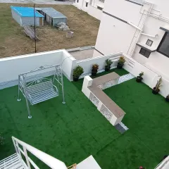 A slightly different angle of the same rooftop project, showing how the space is perfect for entertaining guests or for children to play safely.