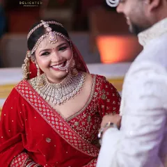 The pure, unscripted joy of a wedding day. My goal is to capture candid moments like this one, where the bride's spontaneous laughter tells you everything you need to know about her happiness.