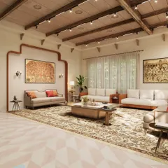 The formal living room in the haveli combines regal proportions with comfortable, modern furnishings. The design features a geometric patterned floor, a wood-beamed ceiling, and traditional Indian art, creating a space that is both grand and inviting.