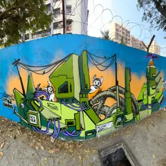 A fisheye view of my piece for the Stylebound festival. I went with a mechanical style, creating a futuristic green machine with little characters peeking out, all set against a sunset-gradient background.
