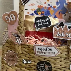 A close-up of the "Fifty & Fabulous" hamper, showing the fun, glittery cutouts and the Yardley London gift set in the background.