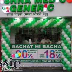 A green and white balloon arch for the opening of a Krishna Medico Generic pharmacy. The colors are matched to the store's branding to create a cohesive and professional look.