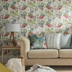 This living room uses a wallpaper with a pattern of herons and water lilies. The design is available in multiple colorways to match any interior decor.
