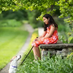 A sweet moment between a girl and her dog. Capturing these bonds, whether with pets or siblings, is what makes a photo session so meaningful.
