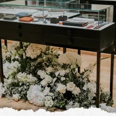 The transformation is where the magic happens. This 'After' shot from the Maybach launch shows how we used a cascade of white florals to elevate a simple display unit. It’s a testament to our belief that even the smallest corner can be turned into a powerful brand moment.