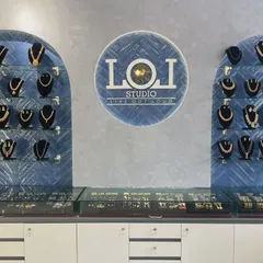 A glimpse into our Mangalore studio, where each jewellery collection is displayed for you to explore. We've designed the space to be welcoming, with our signature blue tile wall showcasing a variety of our handcrafted necklaces and sets.