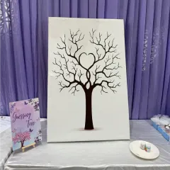 This "Guessing Tree" is a fun and interactive activity for a baby shower. Guests can place their thumbprints as leaves on the tree, creating a beautiful keepsake for the parents-to-be while they guess details about the baby.