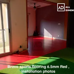 This is my Bravo sports flooring in a 6.5mm thickness, installed in a vibrant red. It's designed for multi-sport use and provides excellent durability and player comfort.