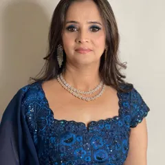 A beautiful glam look for this client. The smokey blue eye and diamond jewelry create a stunning look for an evening reception.