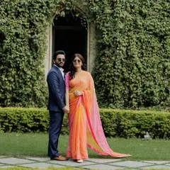 An elegant portrait of a couple at Rambagh Palace, with the bride in a beautiful saree. This shot showcases a classic and timeless approach to pre-wedding photography in a royal setting.
