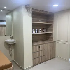 A view of the storage and utility area within a treatment room from my earlier practice. Proper organization and hygiene have always been a cornerstone of my clinical operations.