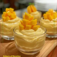 On Day 4 of Navratri, we embraced the color yellow with this joyful mango mousse. This creamy dessert, topped with fresh mango, brings a touch of sunshine and sweetness to your festive plate.
