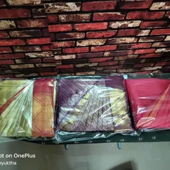 Here are three sarees, each pre-pleated and packed in clear covers. This keeps them neat and easy to identify in your wardrobe.