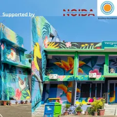 This collage highlights the scale of the community center mural, showing how the artwork wraps around the building's architecture.