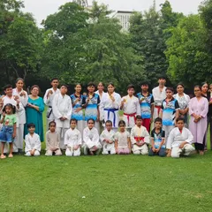 Another group photo with students of all ages and their supportive parents. We are a community dedicated to growth and discipline.