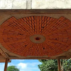 Craftsmanship and material honesty are at the heart of our work. This brick dome is a feature of our 'True Ceiling' series, showcasing a radial pattern of bricks that is not only visually striking but also a functional element of our sustainable design approach.