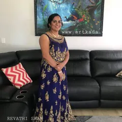 A happy client, Revathi, with her new painting in her home in Sydney, Australia. It's amazing to see my art travel so far.