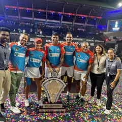 With the champion team of the Tennis Premier League. It's incredibly rewarding to be part of the support staff that helps a team lift the trophy.