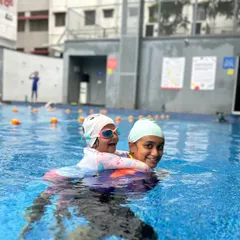 Our coaches become a part of your child's journey. We love seeing our little swimmers grow more confident and playful in the water.