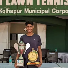 Tavish with his singles and doubles trophies after winning the Under-16 AITA Nationals double crown in Kolhapur. A fantastic experience playing against the best U16 players from across the nation.