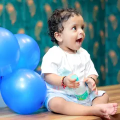 The moment of pure delight. Capturing this exact expression of happiness is why I love photographing kids. It's a genuine, fleeting moment.