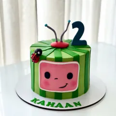 A bright and cheerful Cocomelon cake for a 2nd birthday. I used sharp ganache edges to create the TV shape and added cute fondant details like the ladybug and antennae.