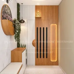 This entrance combines natural wood tones with clean white lines. The main door features vertical black slats, and the foyer includes a bench with shoe storage and a unique wall-mounted planter.